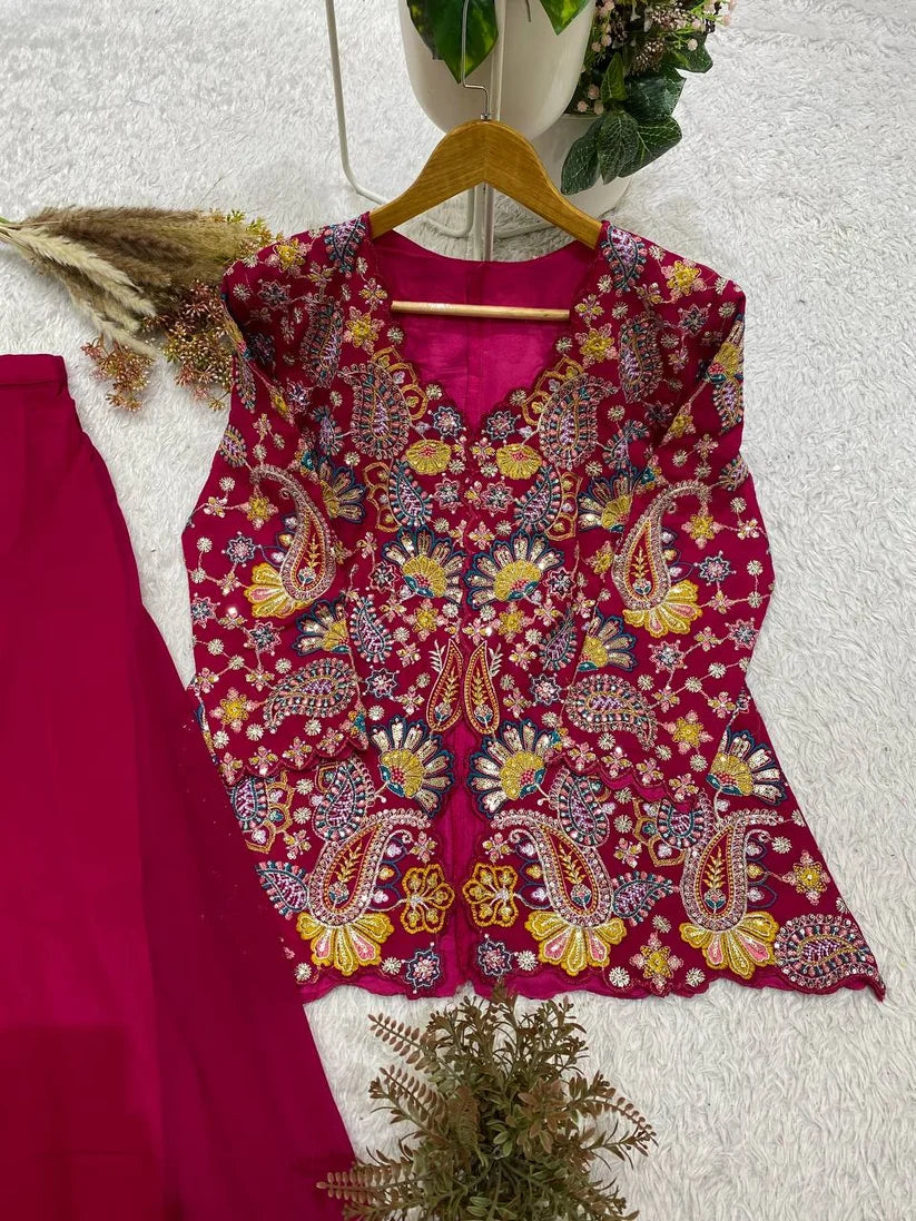 Stunning Rani Pink Embroidered Peplum Sharara Set