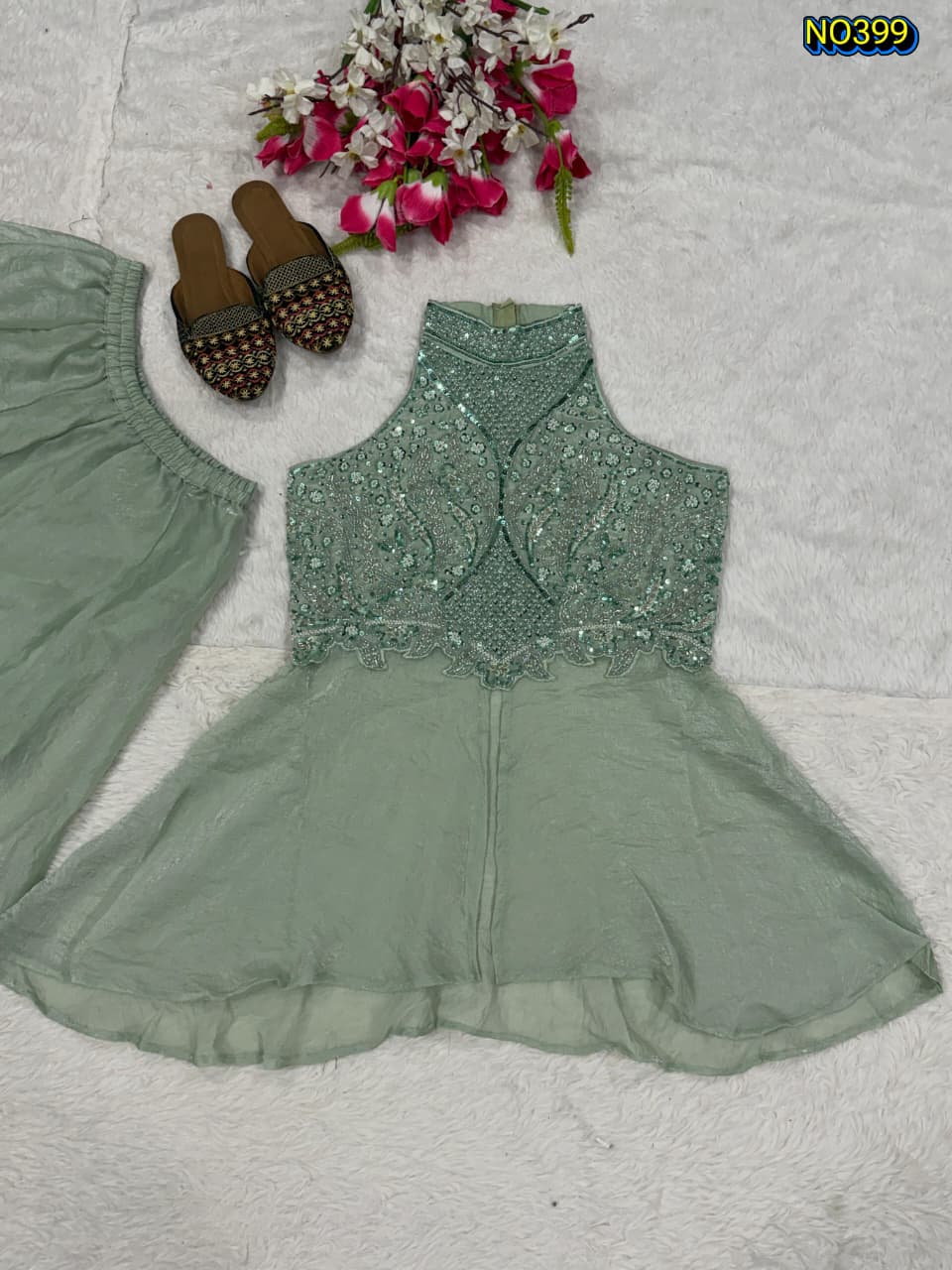 Designer Green Heavy Fandy Crush Peplum and Palazzo Set with Embellished Halter Neck