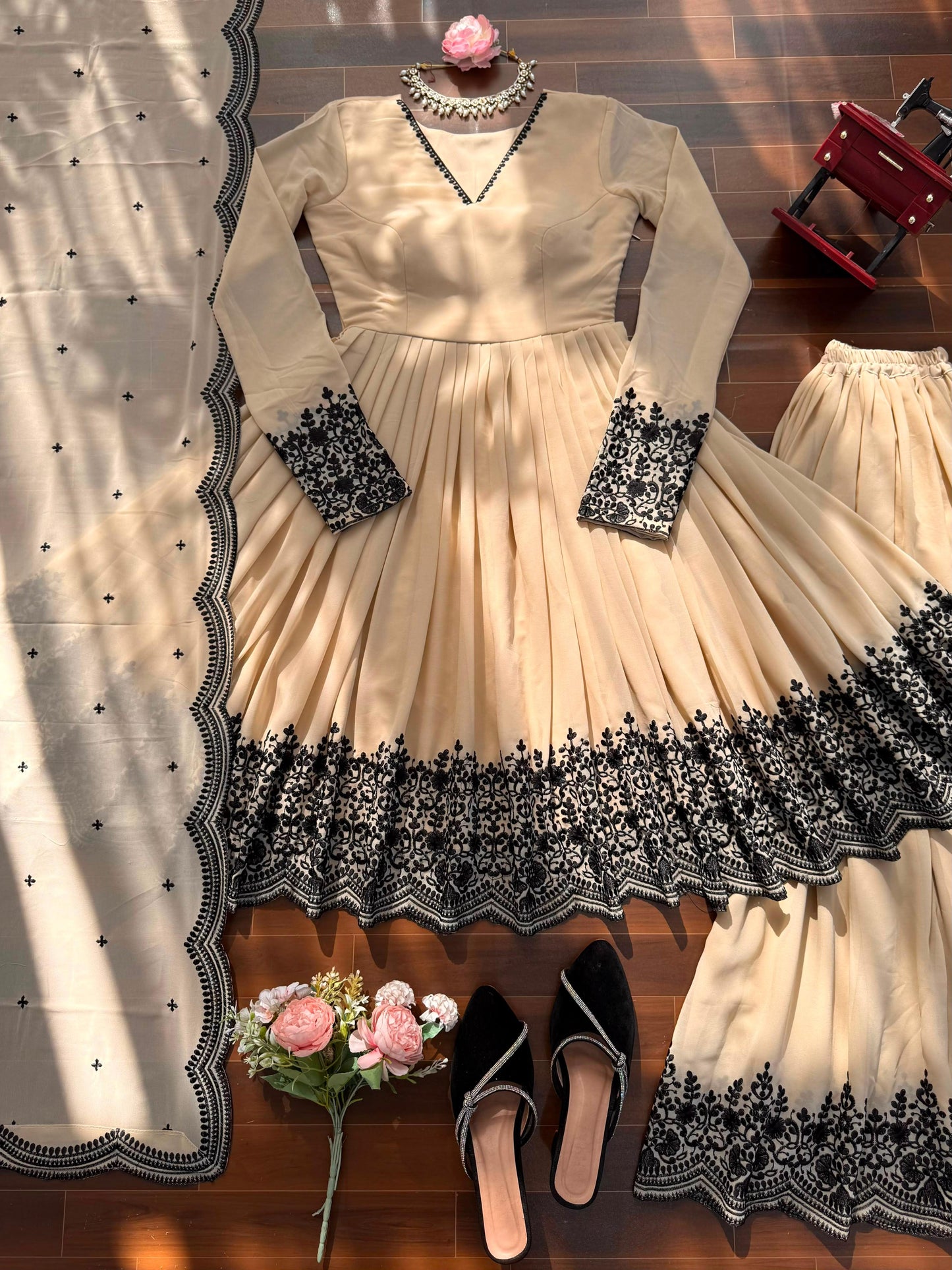 Elegant Cream Faux Georgette Kurta and Suit Set with Contrast Black Embroidery