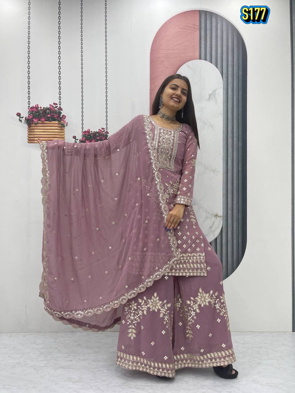 Ggorgeous Mauve Faux Georgette Kurta and Sharara Set with Intricate Embroidery