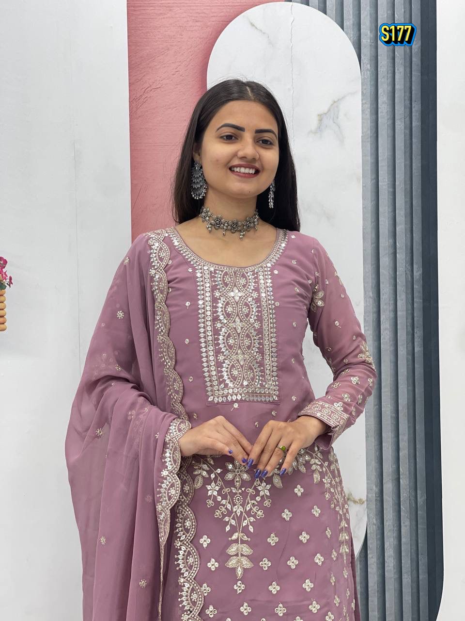 Ggorgeous Mauve Faux Georgette Kurta and Sharara Set with Intricate Embroidery