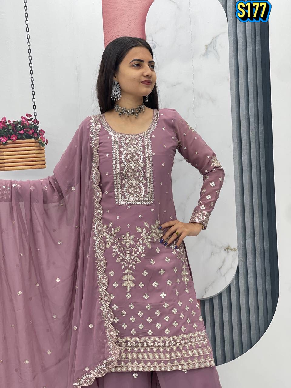 Ggorgeous Mauve Faux Georgette Kurta and Sharara Set with Intricate Embroidery