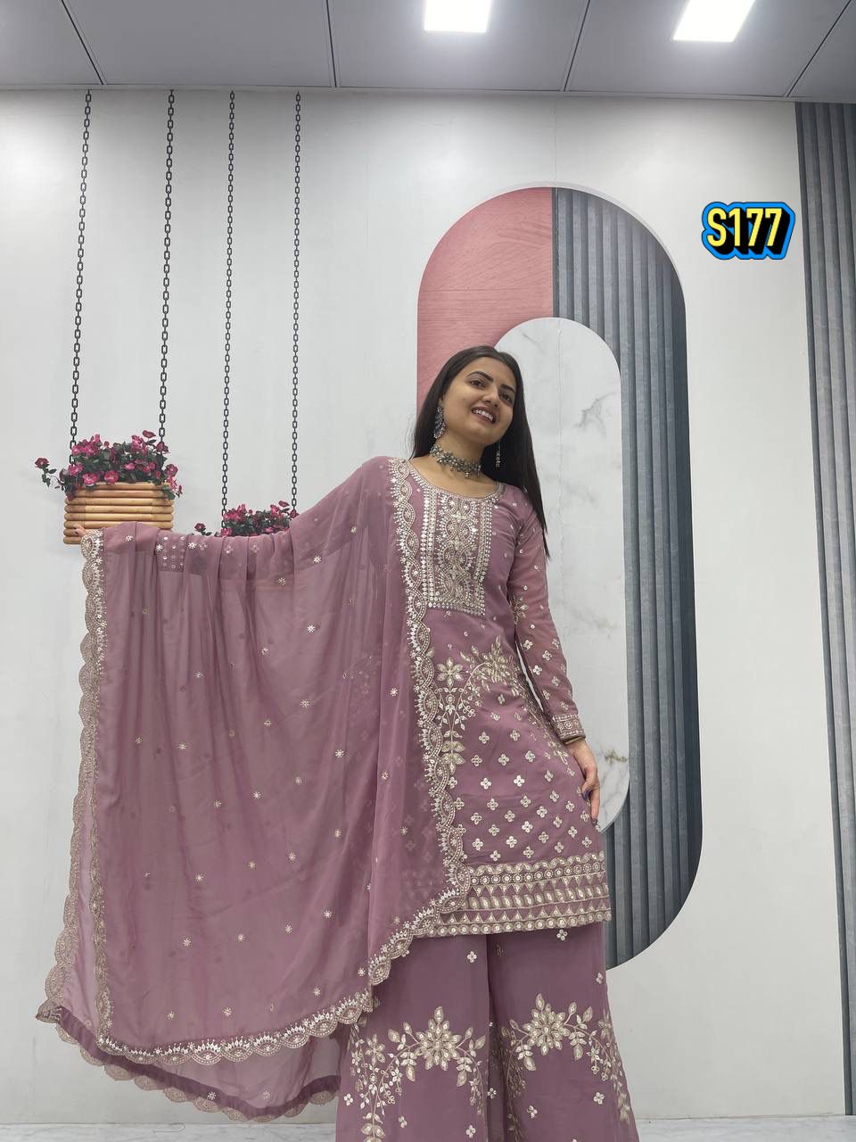 Ggorgeous Mauve Faux Georgette Kurta and Sharara Set with Intricate Embroidery