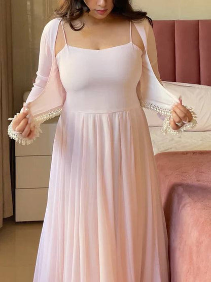 Dreamy Blush Pink Layered Gown with Pearl Embellishments