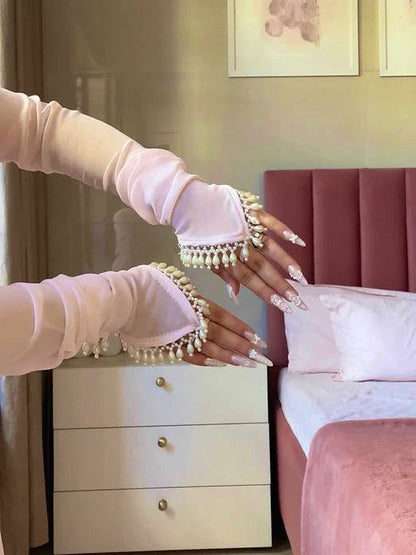 Dreamy Blush Pink Layered Gown with Pearl Embellishments