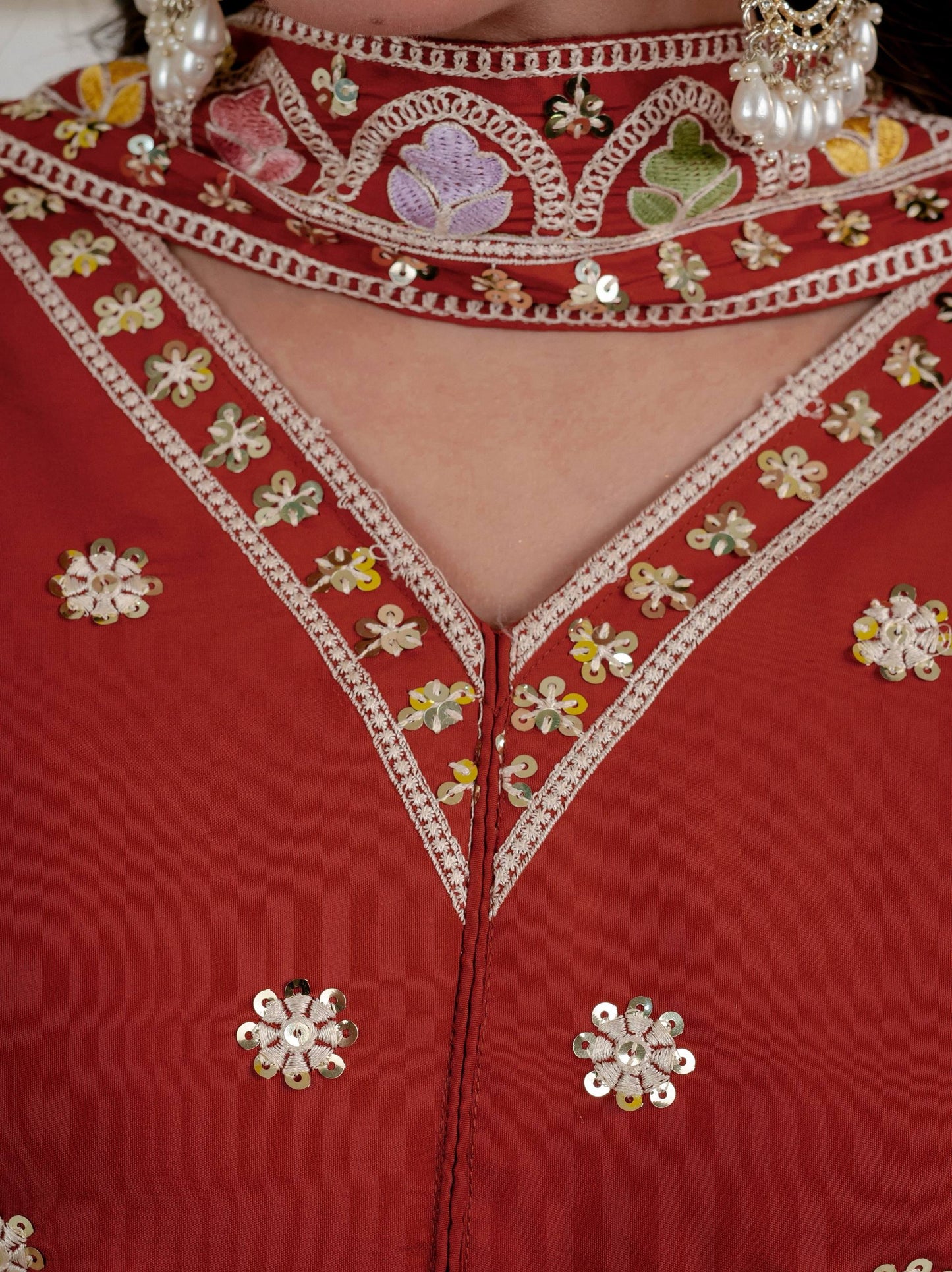 Stunning Rust Red Embroidered Peplum Kurta with Matching Palazzo Set