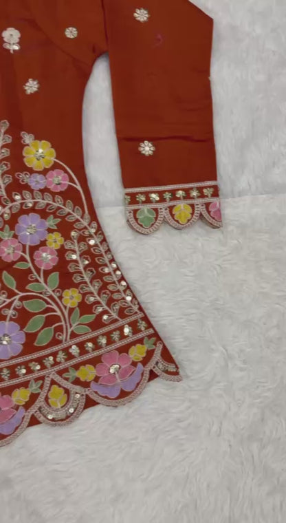 Stunning Rust Red Embroidered Peplum Kurta with Matching Palazzo Set