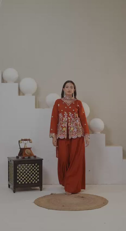 Stunning Rust Red Embroidered Peplum Kurta with Matching Palazzo Set
